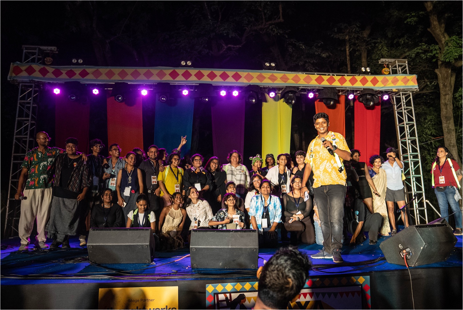 The Road to Utopia team on stage at Maya Bazaar 2025, a queer arts and culture festival.